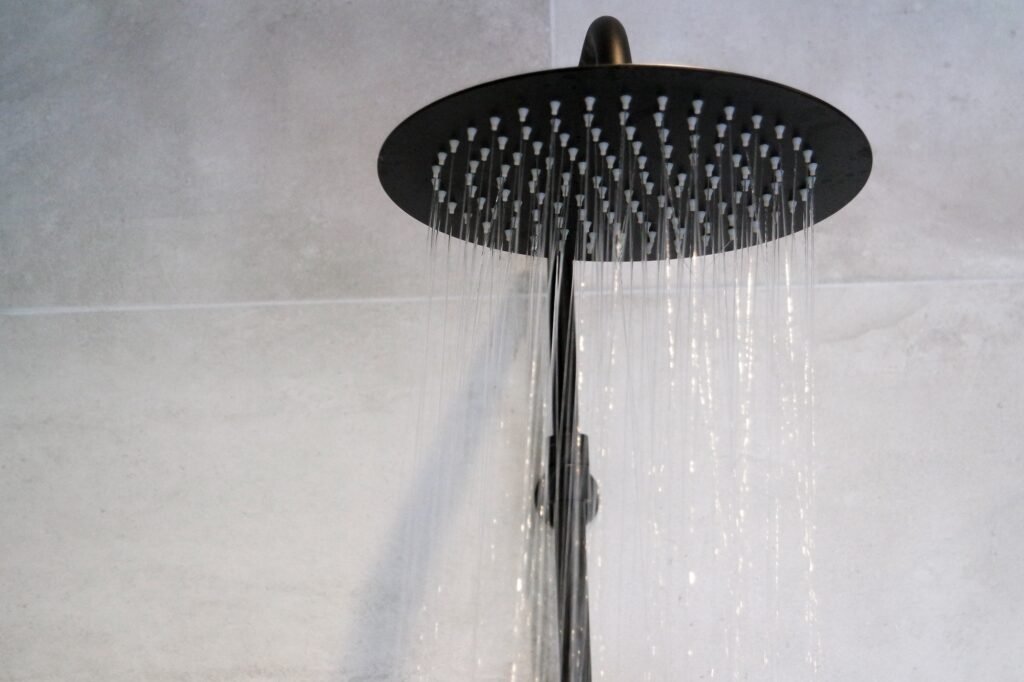 Shower head with running cold water. Cold shower a day keeps doctor...